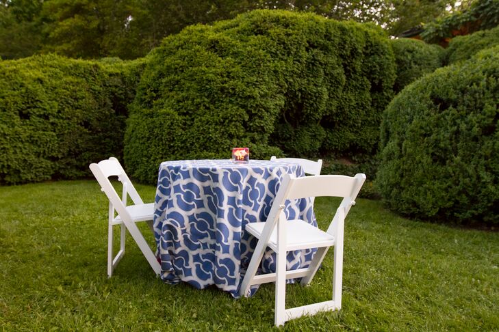 Cocktail hour was held on the South and Front Lawn of the home, with the guests intermingling between 100-year old boxwood bushes.