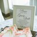 Instead of having a traditional wedding guest book, the bride and groom allowed friends and family to sign messages to be later incorporated into a quilt.