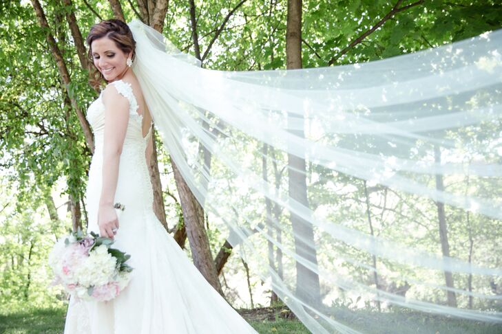 Adrienne wore a vintage inspired dress with a gold underlay and lace. She