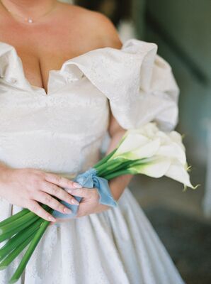 Bride Holding Simple, Clean Bouquet of White Calla Lilies With Blue Ribbon, Ball Gown