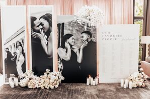 Seating Chart Display With Black-and-White Engagement Photos. White Roses and Orchids