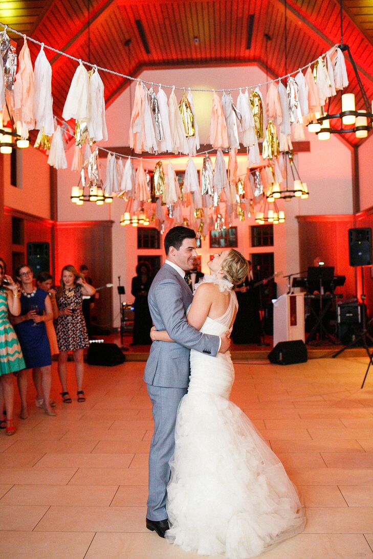 Stationed below tassel-covered banners, Tiffany and Joe took their first dance to “Maybe I’m Amazed” by Paul McCartney. “Not only is it a beautiful, classic song, but it was also slow and short so that we didn’t need to take dancing lessons before our big day,” Tiffany says. “It was one of the only times all evening that we had time to talk “alone” and reflect on how amazing everything was going.”