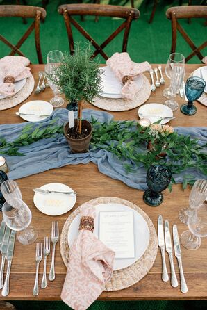 Wood Farm Table With Blue Runner and Rosemary Topiary Centerpiece