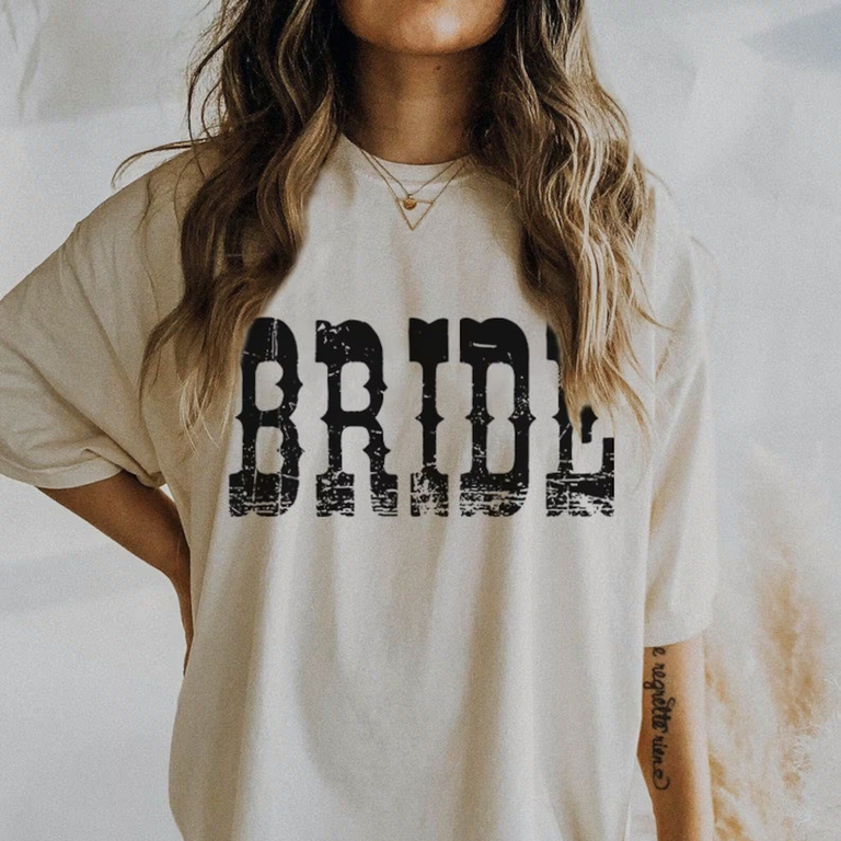 Old western font t-shirt saying "Bride" for the best party outfits