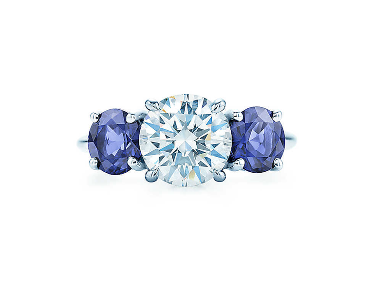 Tiffany & Co. three-stone engagement ring with sapphire side stones