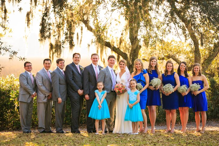 “It was very important that our wedding party be comfortable and relaxed,” Amanda says. “We did not pick out the attire for the wedding party. We simply told the bridesmaids to wear blue and the gentlemen to wear gray suits. The flower girls decided they'd rather wear teal, so if they were happy, we were happy. We provided the ties and socks for the fellas, and the jewelry and wraps for the ladies. Everyone got to wear what they liked and it surprisingly all came together beautifully.”