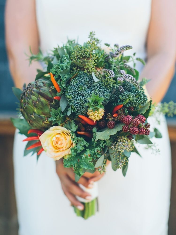 non-floral wedding bouquet with fresh vegetables and berries