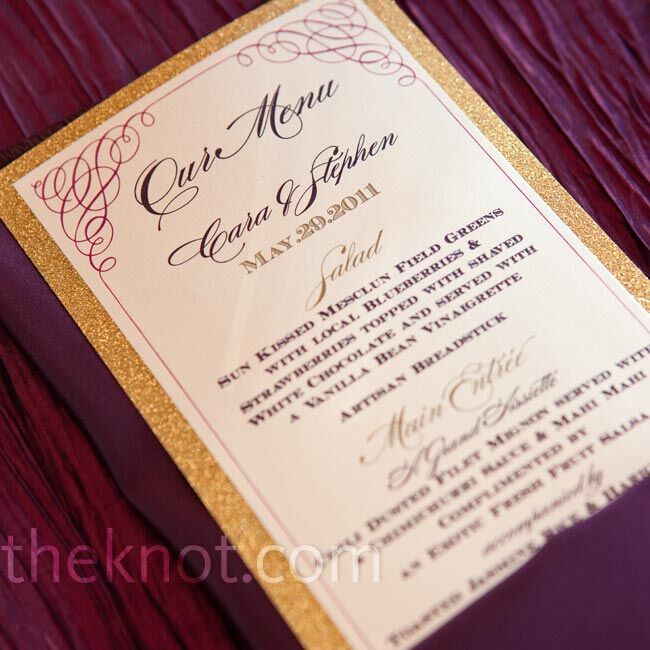 The gold-backed menu cards matched the escort card design and were tucked into plum-colored linen napkins.