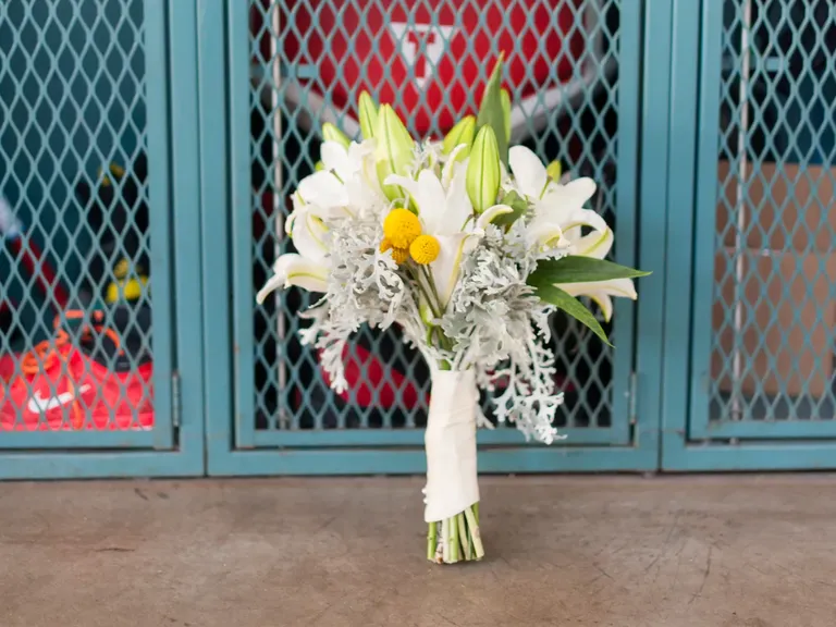 Fresh Lily Wedding Bouquet With Closed Buds and Dusty Miller