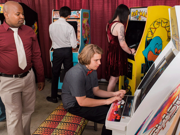 Vintage arcade area at a wedding reception.