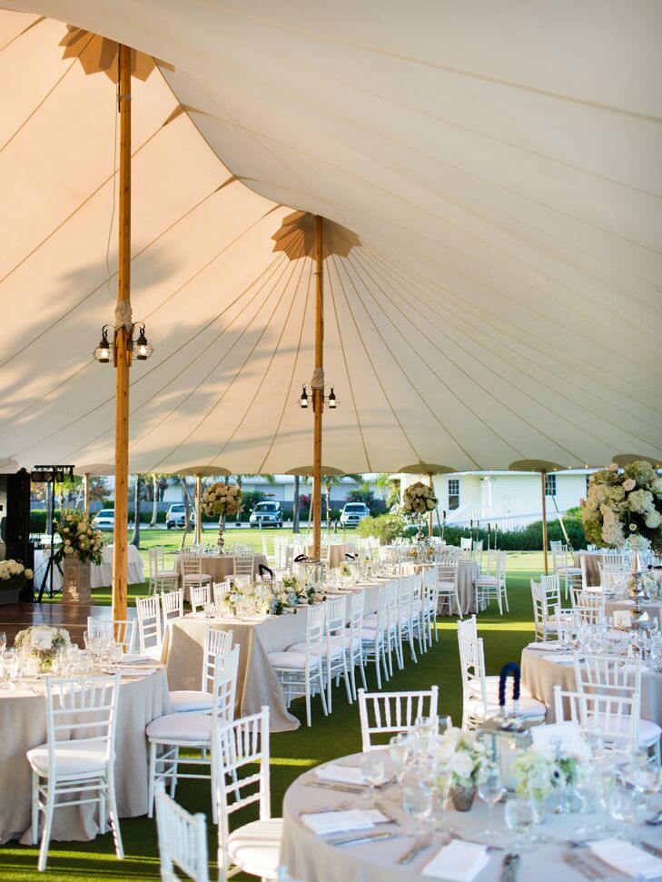 The reception was held outdoors on the Croquet Lawn of  Gasparilla Inn & Club, under a large, white tent.