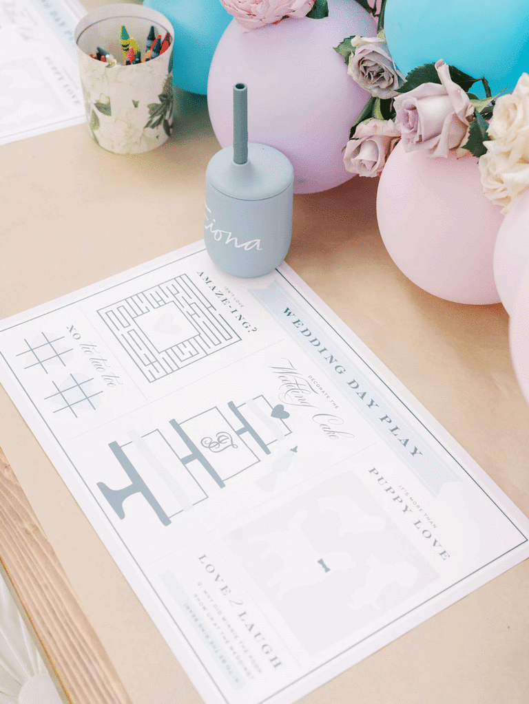 Fun kids' table with activity page and crayons for children at weddings.