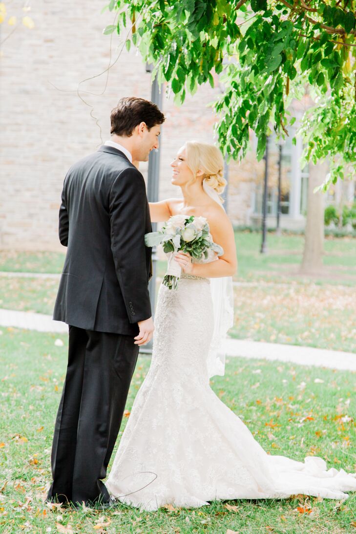 Corinne ended up choosing the first dress that she tried on at Betsy Robinsons Bridal Collection—an ivory gown designed by Allure Bridals, with a sweetheart neckline and mermaid-style silhouette, accented in lace and English net.