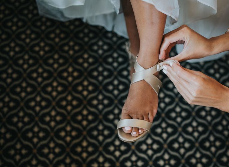 Josephine wanted stylish sandals that wouldn't catch in the slats of the dock during the ceremony at Detroit Yacht Club in Detroit, Michigan.