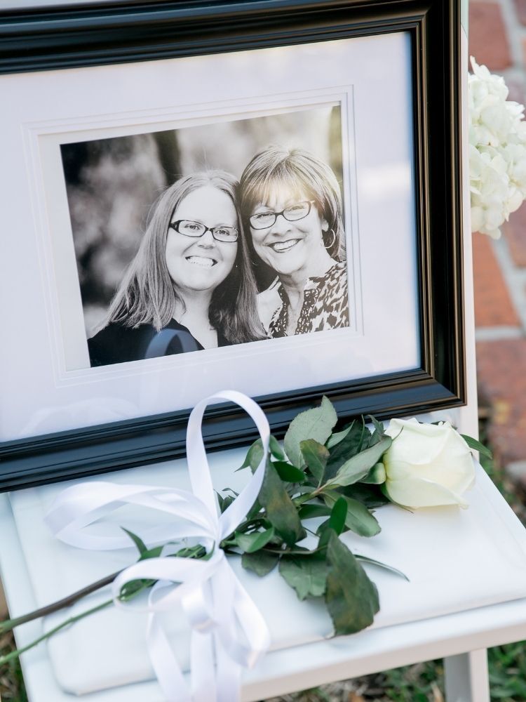 picture of deceased loved one with white rose