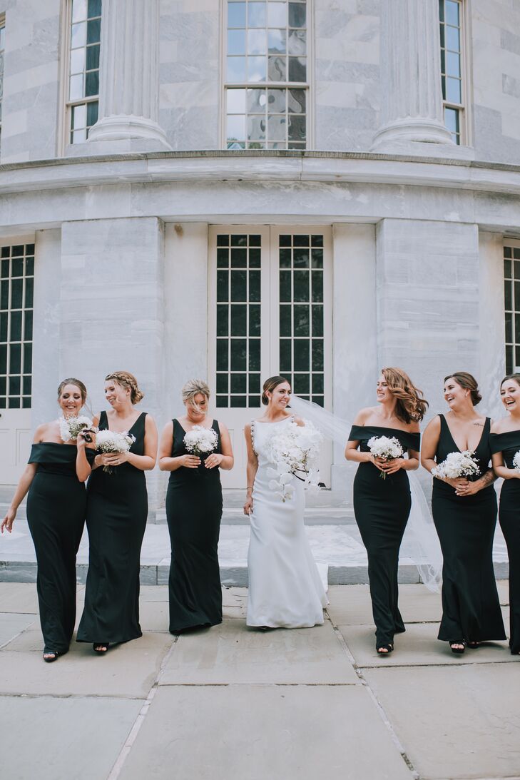 Elegant Bridesmaids Wearing Long Black Gowns