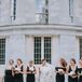 Elegant Bridesmaids Wearing Long Black Gowns