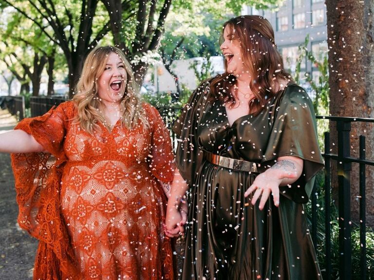 Brides tossing confetti during elopement