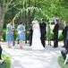 Flowery Wedding Arch at Springtime Ceremony
