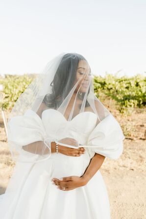 Pregnant Bride Posing While Holding Belly
