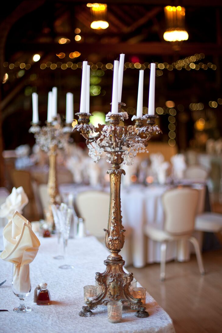 The reception decor included ornate gold candelabras that perfectly suited the castle venue.