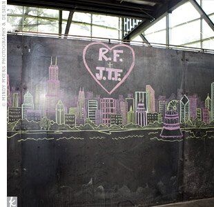 To add a personalized twist to the space, Jessica and Rob’s wedding coordinators had the couple’s initials and the skyline of their home city, Chicago, drawn in chalk, creating a showstopping backdrop.