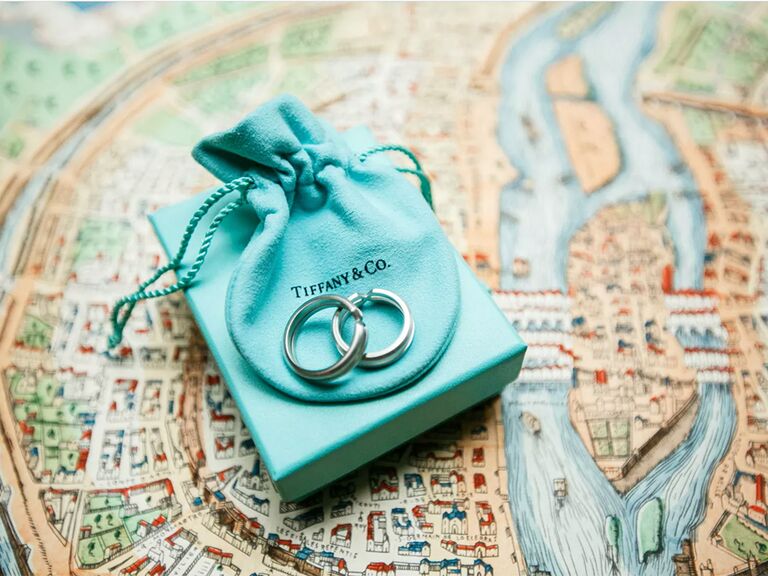 Tiffany & Co. jewelry drawstring bag with hoop earrings