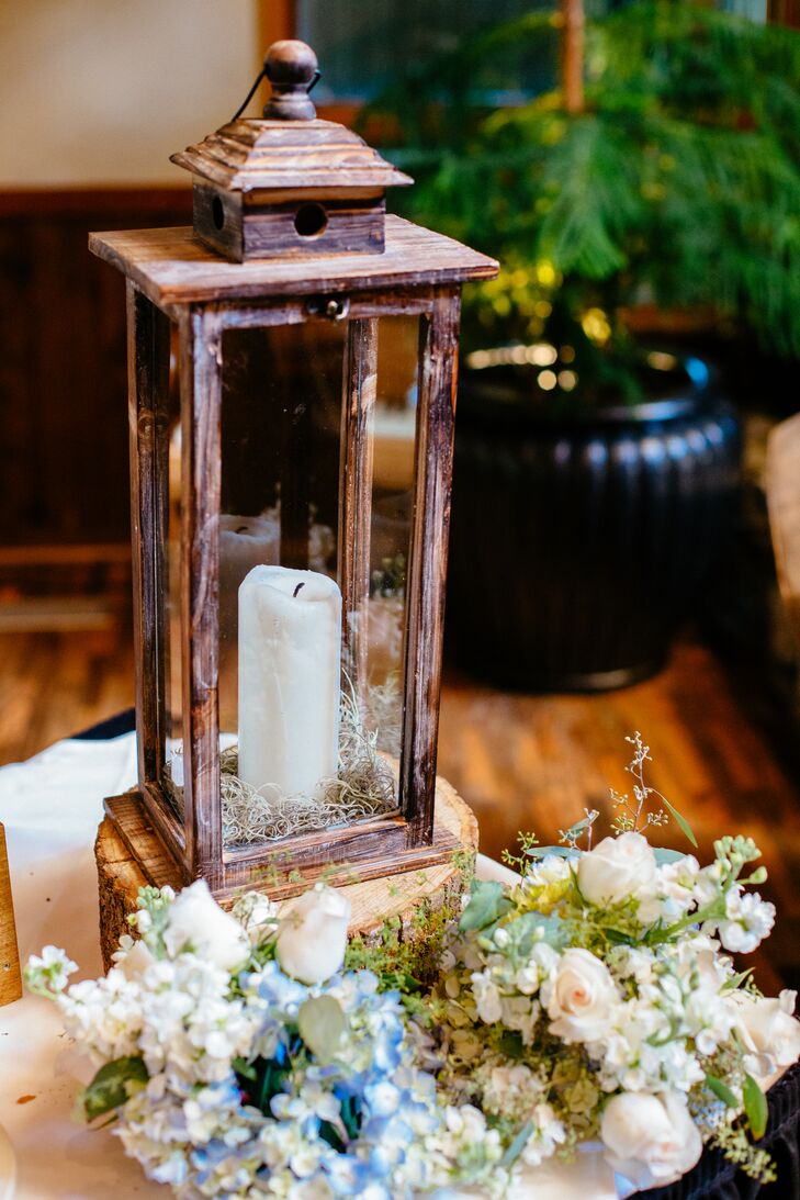 Inspired by their mountainside destination wedding, the couple went with a shabby-chic theme and decorated with wood, burlap and lace accents.