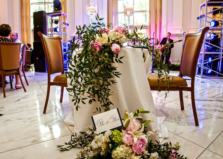 The lush flower arrangements included lilies,
peonies, hydrangeas, roses and orchids.