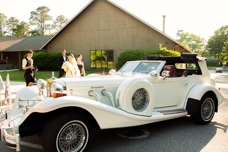 Ashley and Tanner left through a sparkler-lined exit and into a classic, white Excalibur getaway car.