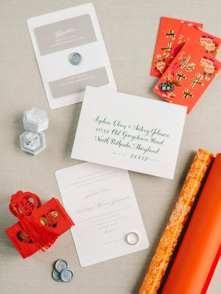 Beautiful orange and white Chinese-inspired wedding invitation suite ready to send
