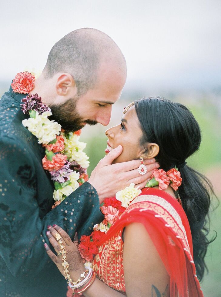 Couple Wearing Indian Jai Mala Flower Garlands