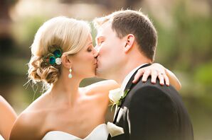 Curled Bridal Updo and Peacock Hair Accessory