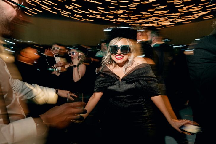 Wedding Guest With Cowboy Hat and Sunglasses Dancing at Reception