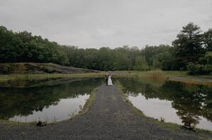 Bride and Groom Posing on Gravel Pier on a Lake in Upstate New York