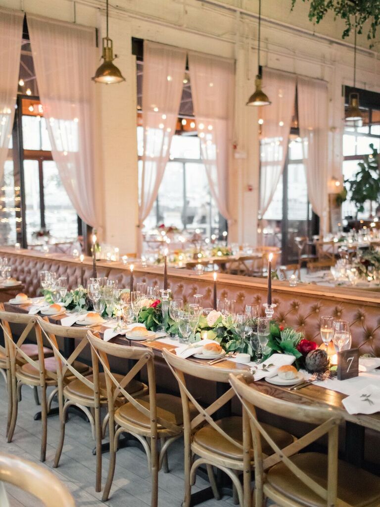 restaurant wedding venue with low centerpieces and taper candles