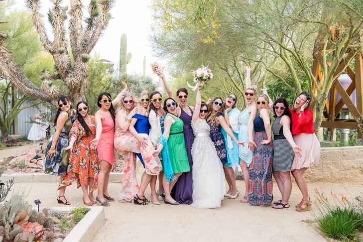 In lieu of a traditional “something blue” (and in lieu of bridesmaids), Anna asked her best friends to wear something blue. Before the ceremony, she handed out personalized “Bride’s Tribe” sunglasses as a special shout-out. “My girls are my family,” she says.