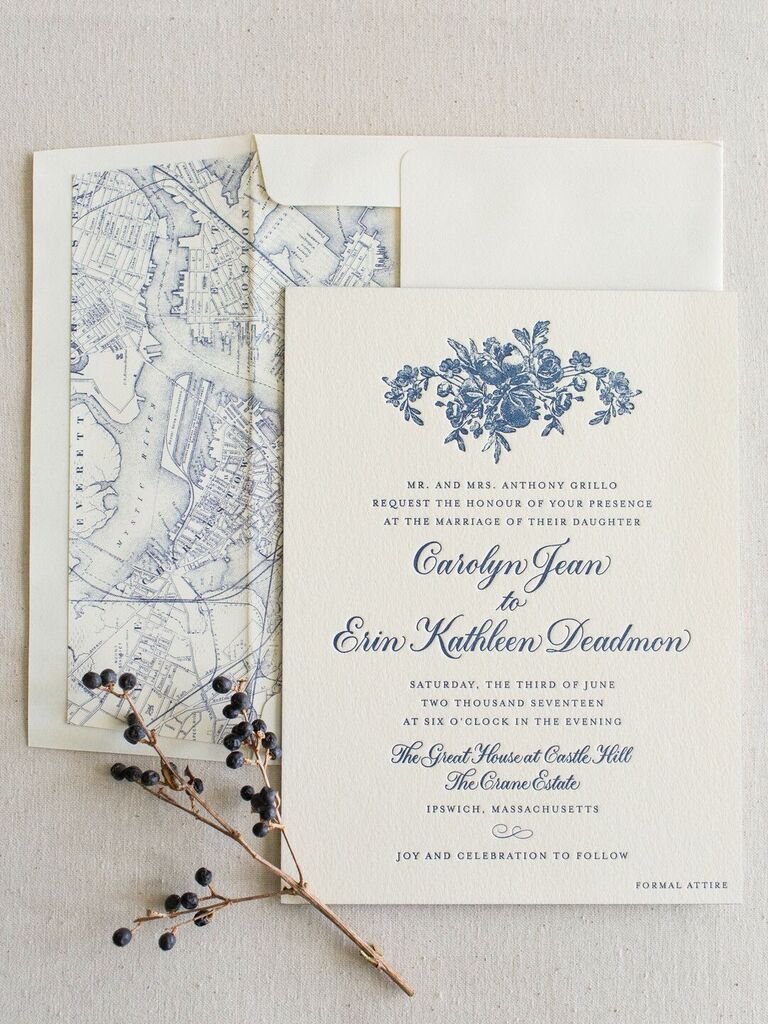 blue letterpress wedding invitation with floral motif and antique map envelope liner
