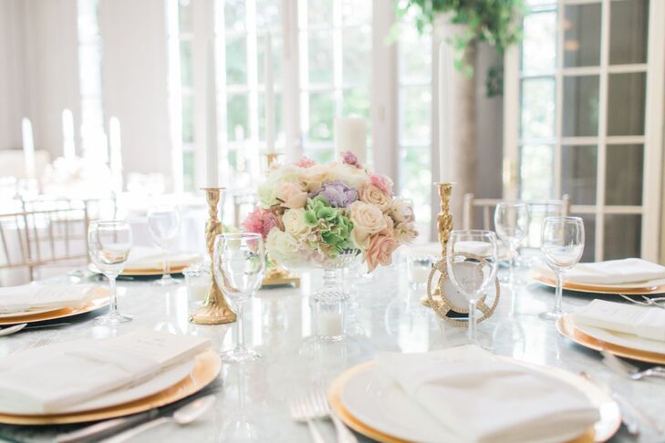Gold flatware was used to play up  the simplicity of the all-white tablescapes, where guests dined on watermelon and grapefruit mocktails during dinner.