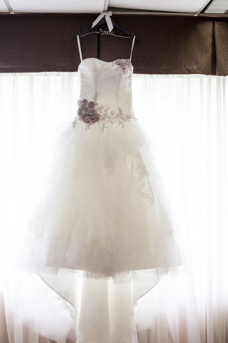 This bride had pieces of lace handkerchief sewn throughout the bottom of her Alfred Angelo Sleeping Beauty wedding dress and added lace edging at a specialty shop. "I wanted something unique, vintage and one-of-a-kind," Ashley says.