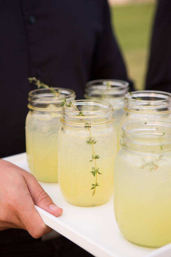 The cocktail hour took place inside the cocktail tent which was transformed with comfortable outdoor lounge furniture to give it a laid-back vibe. Signature drinks such as the Ginger Mojito and the Sage Lemonade were served in mason jars.
