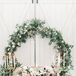 Romantic Sweetheart Table with Candelabras, Floral Arrangement and Wreath Backdrop