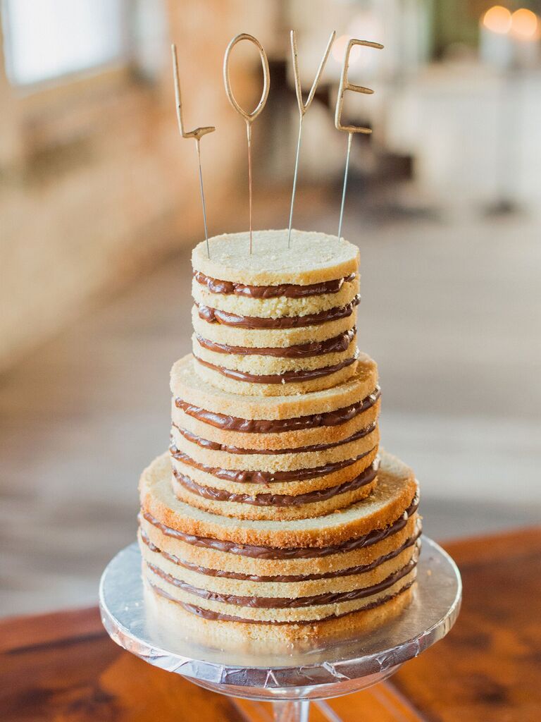 three tier vanilla naked wedding cake with chocolate filling and gold LOVE cake topper