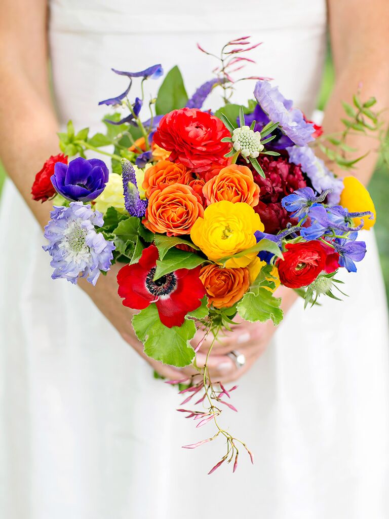 Bright bouquet with anemones, scabiosa and ranunculus