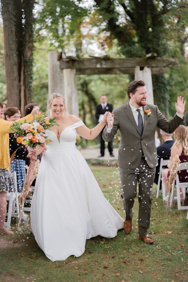 Bride and Groom During Wedding Ceremony Recessional