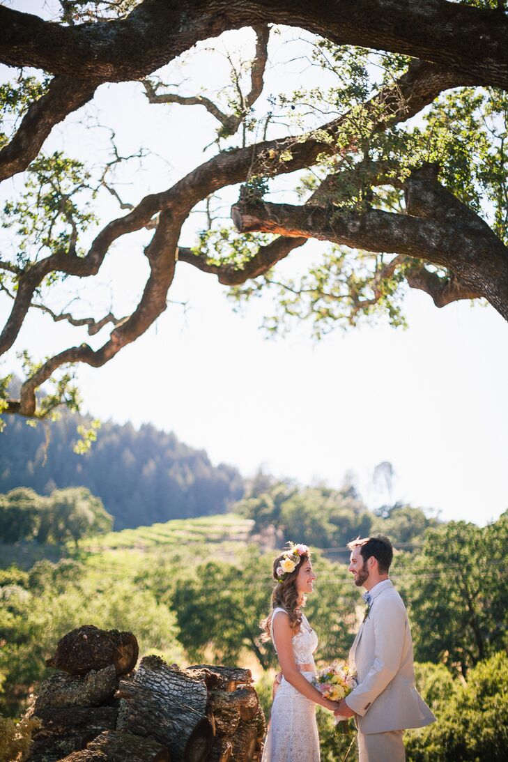 A soft color palette filled with pastels of pink, yellow and green blended in well with the naturally rustic elements at this outdoor ranch wedding. H