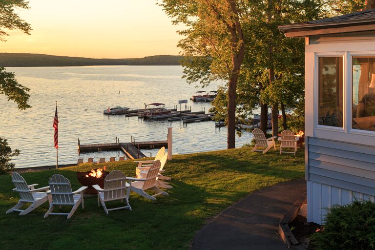 the poconos pennsylvania lake house with outdoor fire pit and sunset bachelor party