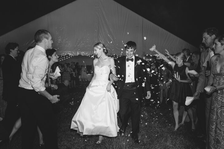 “For the send-off, we wanted to be as eco-friendly as possible,” Elizabeth says. “We used freeze-dried rose petals and seed-paper cones that not only were biodegradable, but would grow wildflowers if planted.”