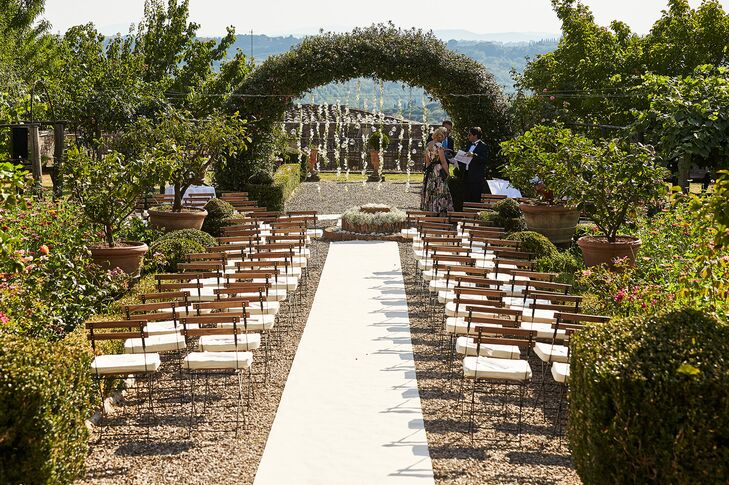 The ceremony took place in the botanical garden of Villa di Geggiano in Tuscany, Italy, overlooking the lush Siena countryside (responsible for the famous Chianti Classico wine).