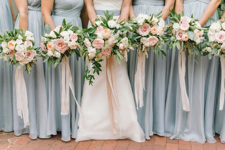Gavita Flora also designed the bridal party's bountiful bouquets. They mirrored Jauchy's and included white, peach and pink garden roses.